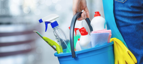 Cleaning,Lady,Holding,A,Bucket,Of,Cleaning,Products,In,Her