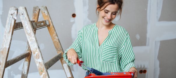 Capable,Happy,Young,Woman,Doing,Home,Renovations,Or,Decorating,A