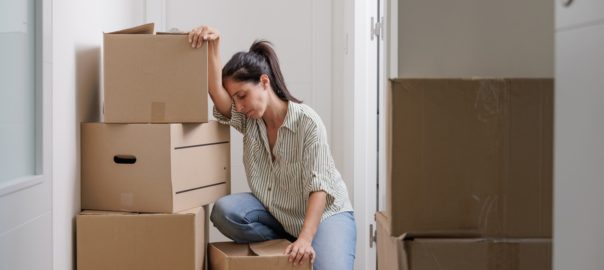 Pretty,Single,Young,Woman,Tired,Of,Carrying,Moving,Boxes,In